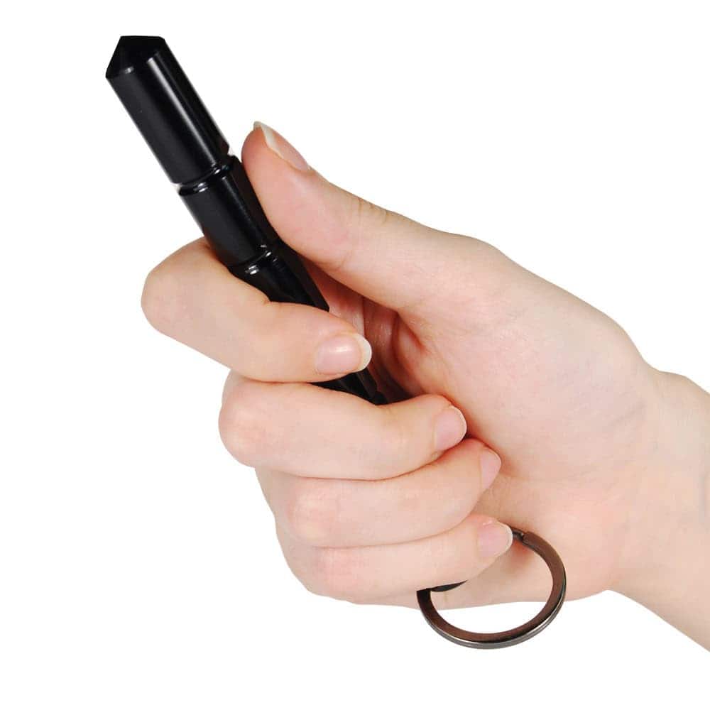 Black Kubotan Aircraft Grade Aluminum Keychain in Hand
