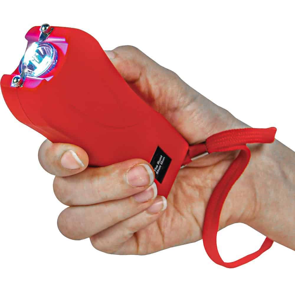 Red Runt Rechargeable Stun Gun With Flashlight And Wrist Strap Disable Pin Shown in Hand