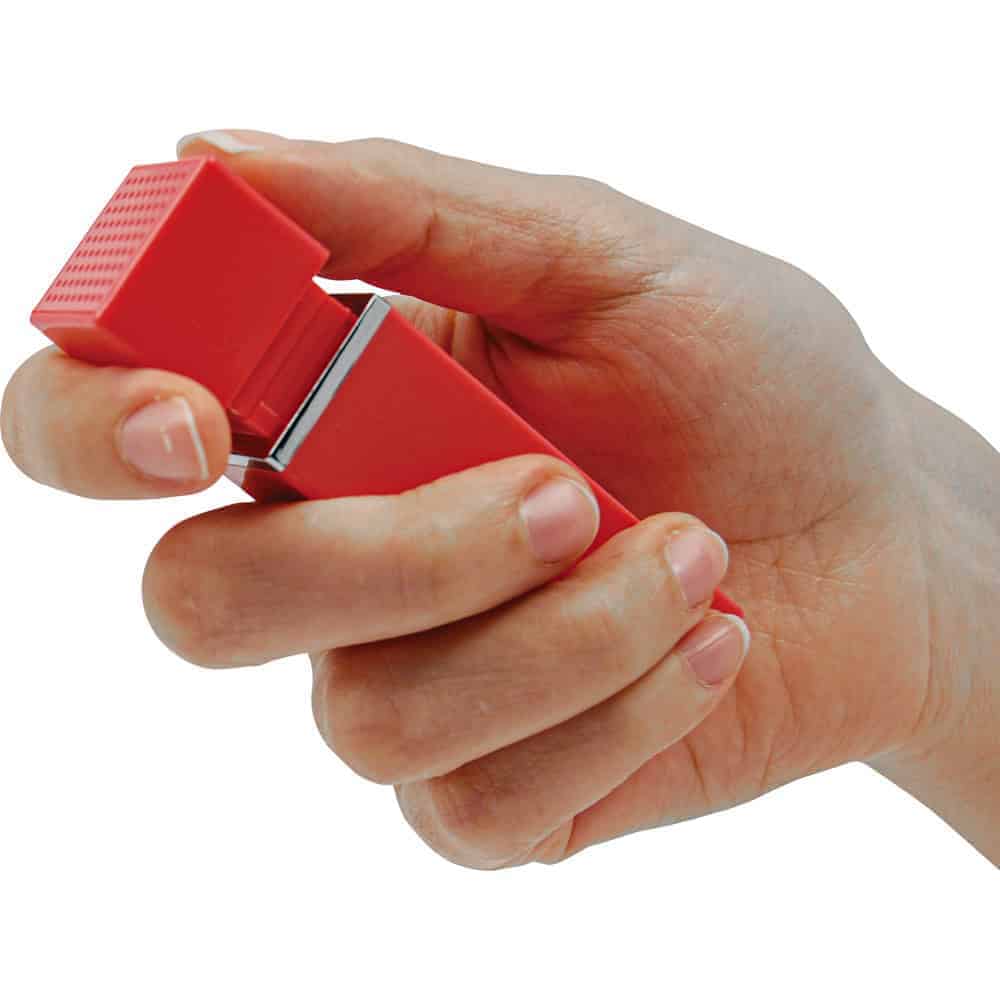Pink 90 db Lipstick Alarm Shown in Hand