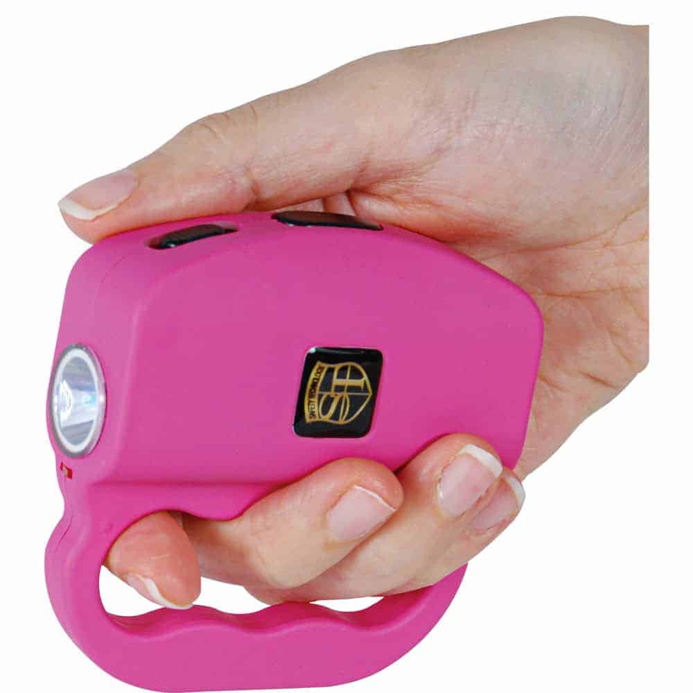 Pink 75 Million Volt Talon Stun Gun and Flashlight in Hand with Flashlight Forward | Advanced Safety Tech Pink 75 Million Volt Talon Stun Gun and Flashlight in Hand with Flashlight Forward Advanced Safety Tech Pink 75 Million Volt Talon Stun Gun and Flashlight in Hand with Flashlight Forward