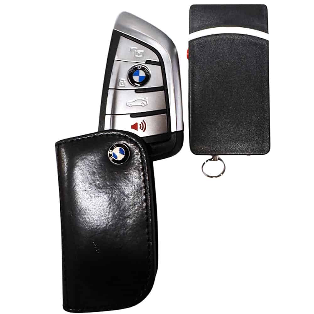Black 60 Million Volt Keychain Fob Stun Gun and Flashlight Shown Beside A BMW Key Fob for Size | Advanced Safety Tech Black 60 Million Volt Keychain Fob Stun Gun and Flashlight Shown Beside a Bmw Key Fob for Size Advanced Safety Tech Black 60 Million Volt Keychain Fob Stun Gun and Flashlight Shown Beside a Bmw Key Fob for Size